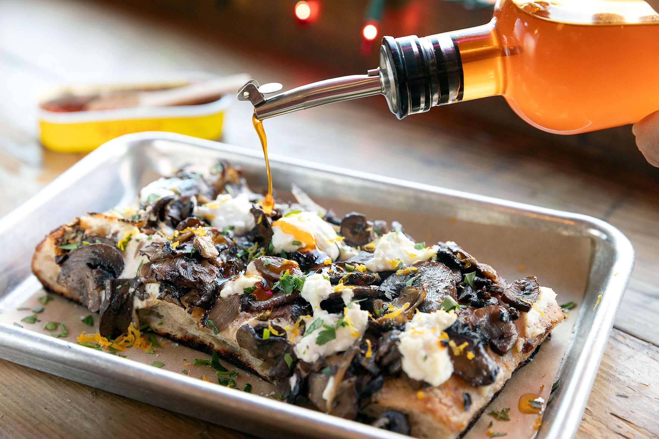 The Mushroom Square pizza with ricotta, roasted blend of mushrooms, chevre, lemon zest parsely at Psychic Pie in Sebastopol, California