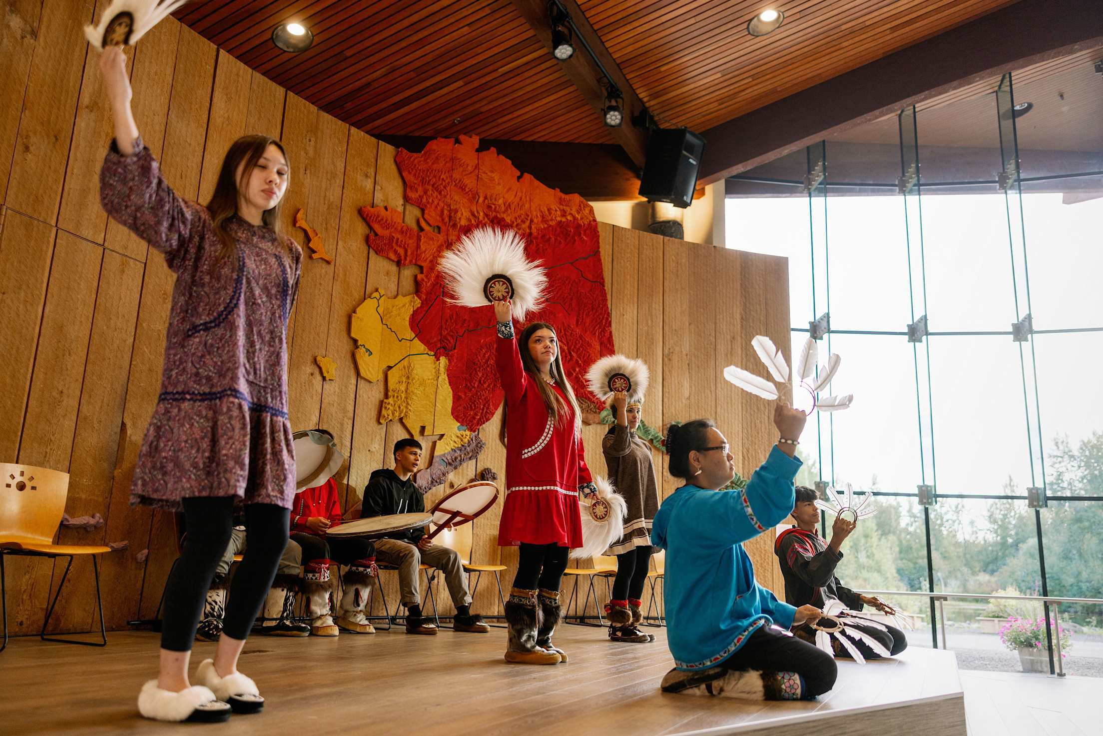 Dancers on stage at the Alaska Native Heritage Center in Anchorage, Alaska.