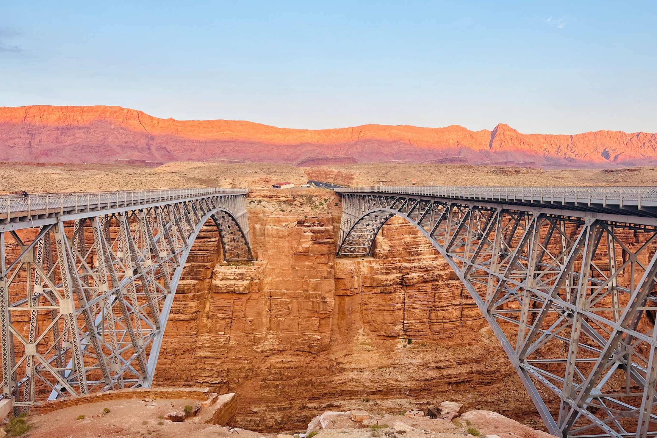 A sunset view of the historic Navajo Bridge in Arizona.