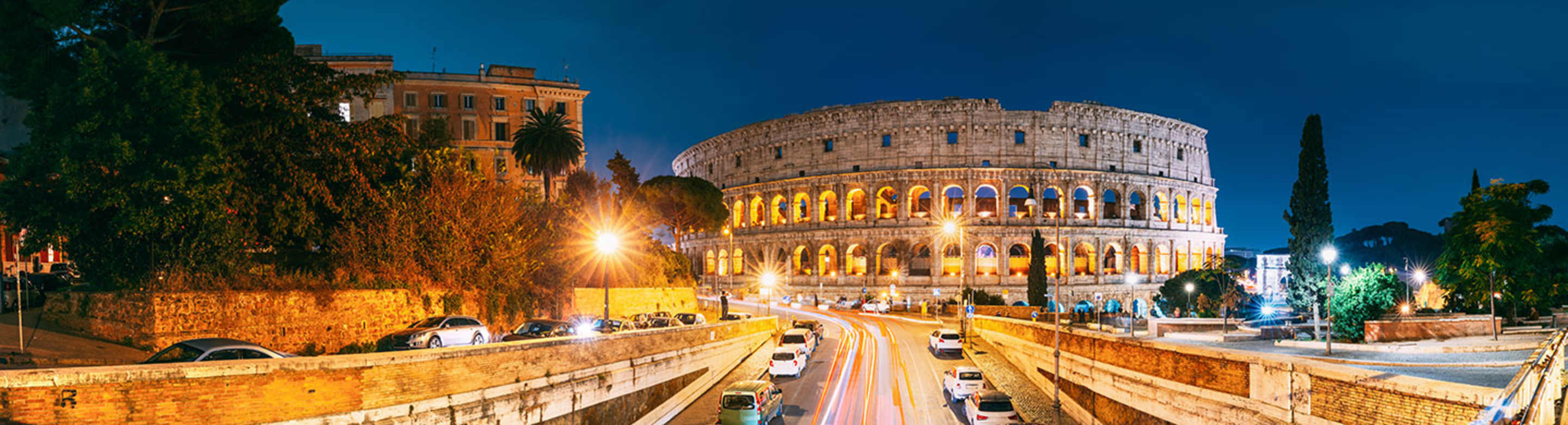 driving outside the colosseum in rome, italy
