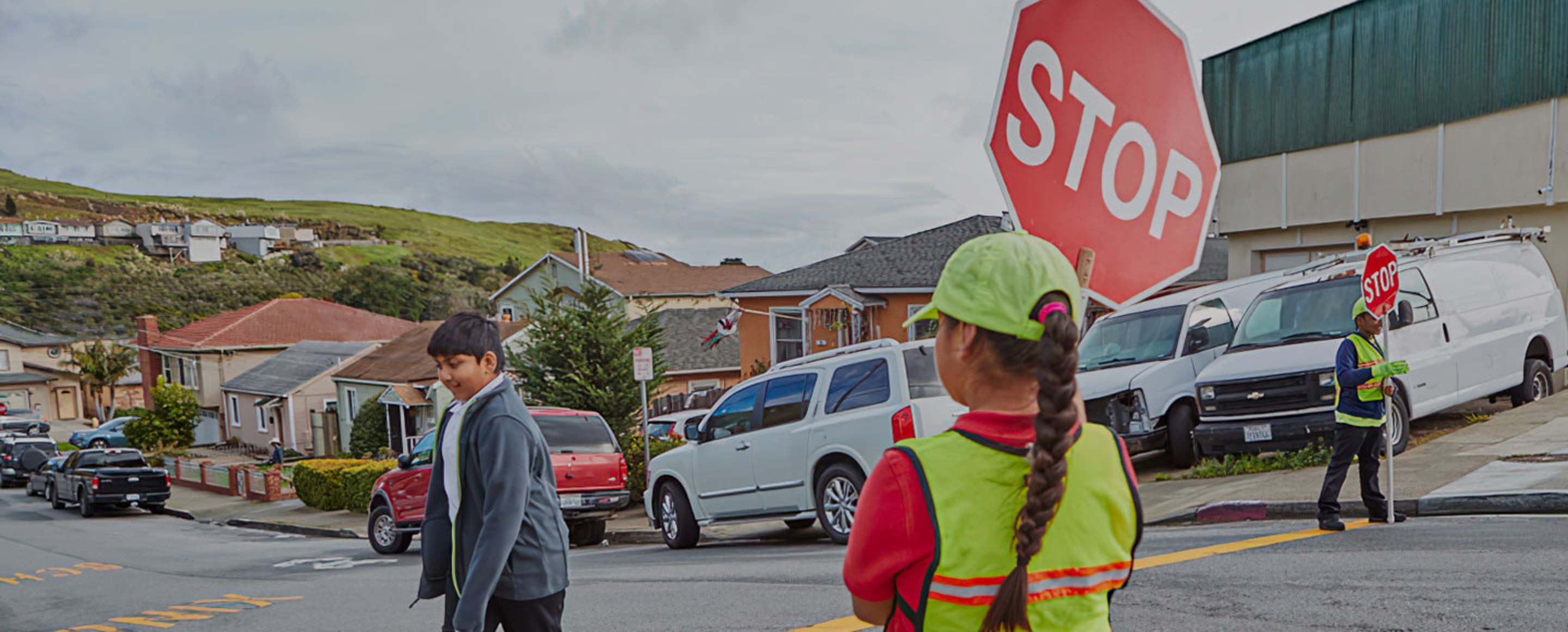 AAA School Safety patrol helping children cross the street