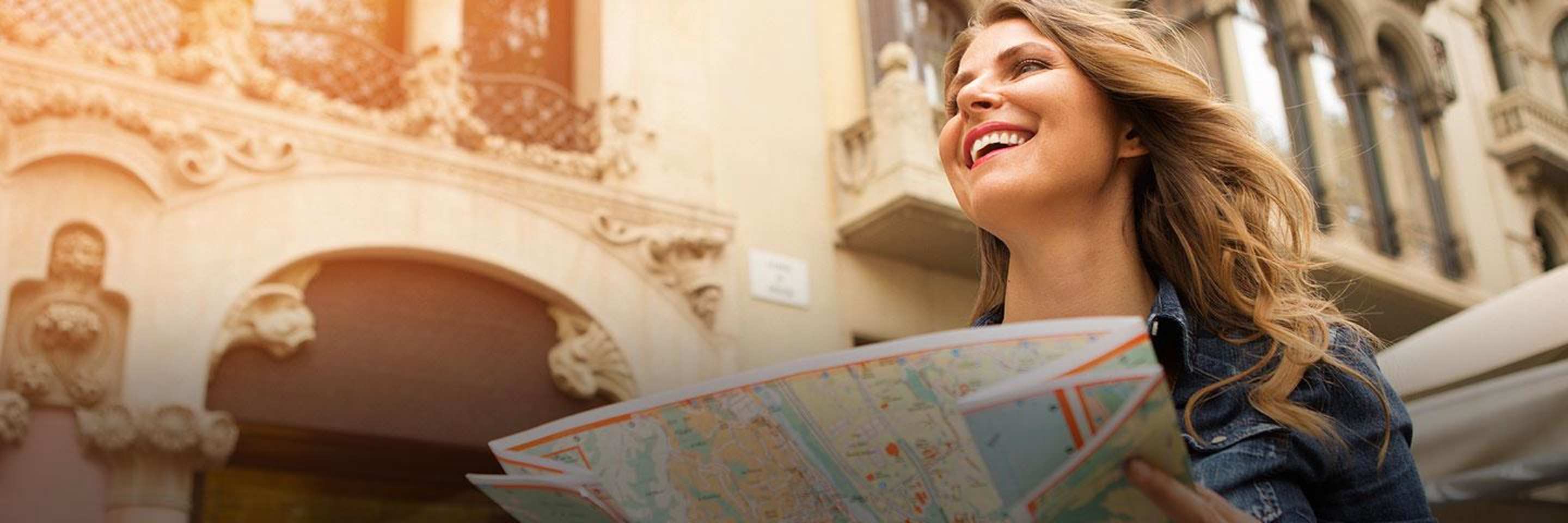 Woman using a map she received from AAA