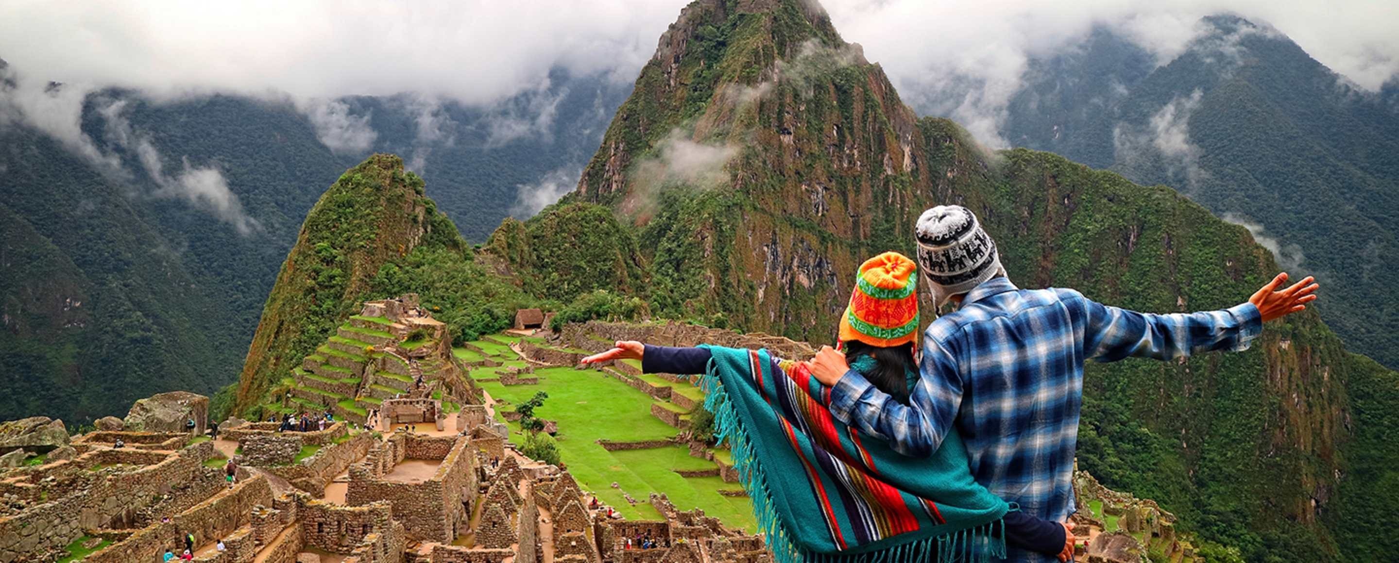 AAA Members on top of Machu Picchu after booking with AAA Travel for the Best Price Guarantee