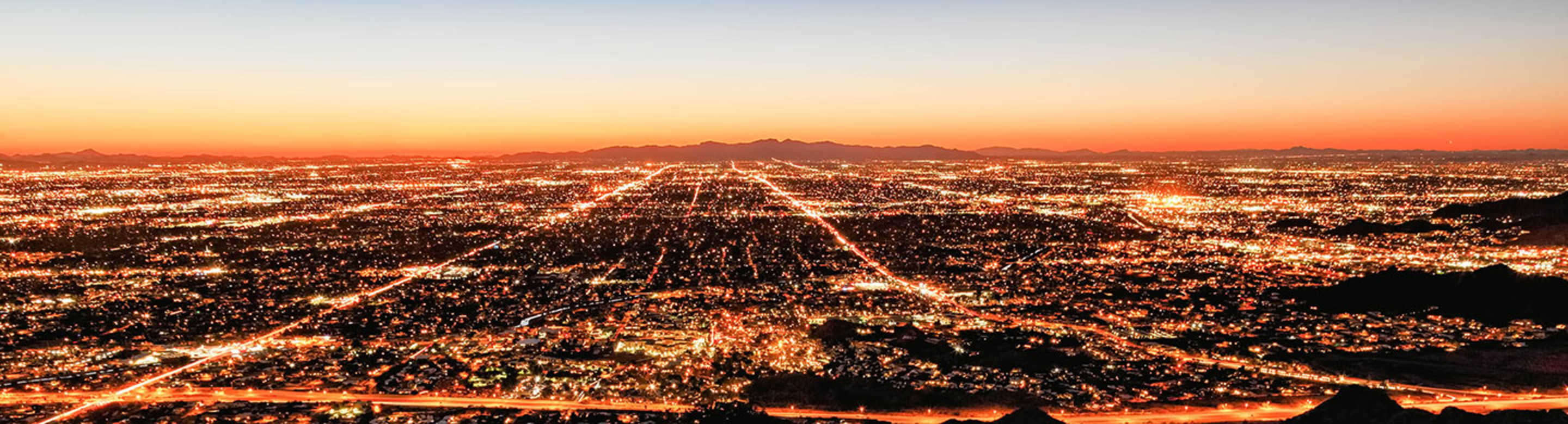 arizona aaa offices visible in city at night