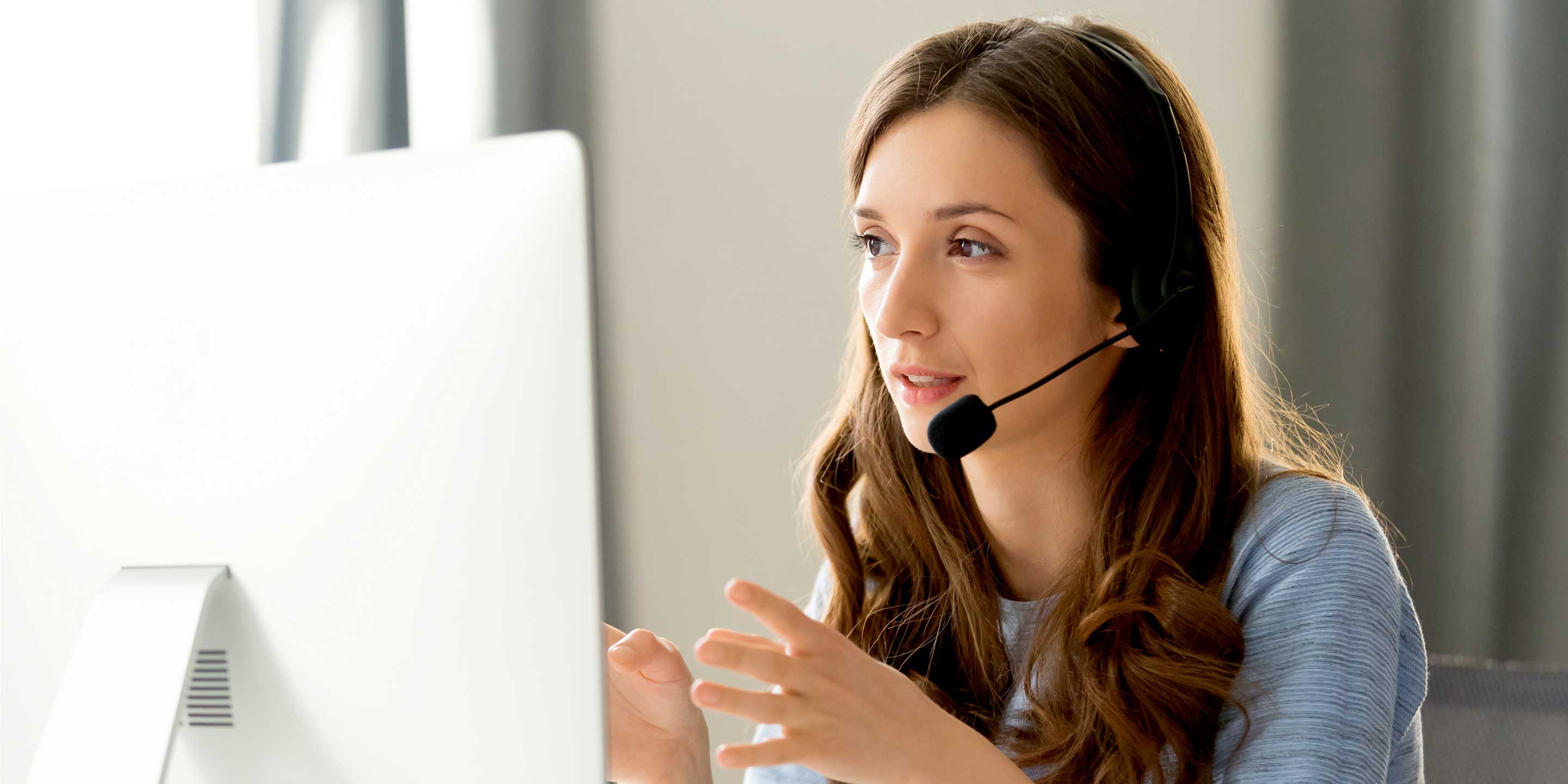 AAA Insurance Agent on the phone with a client reviewing their policy