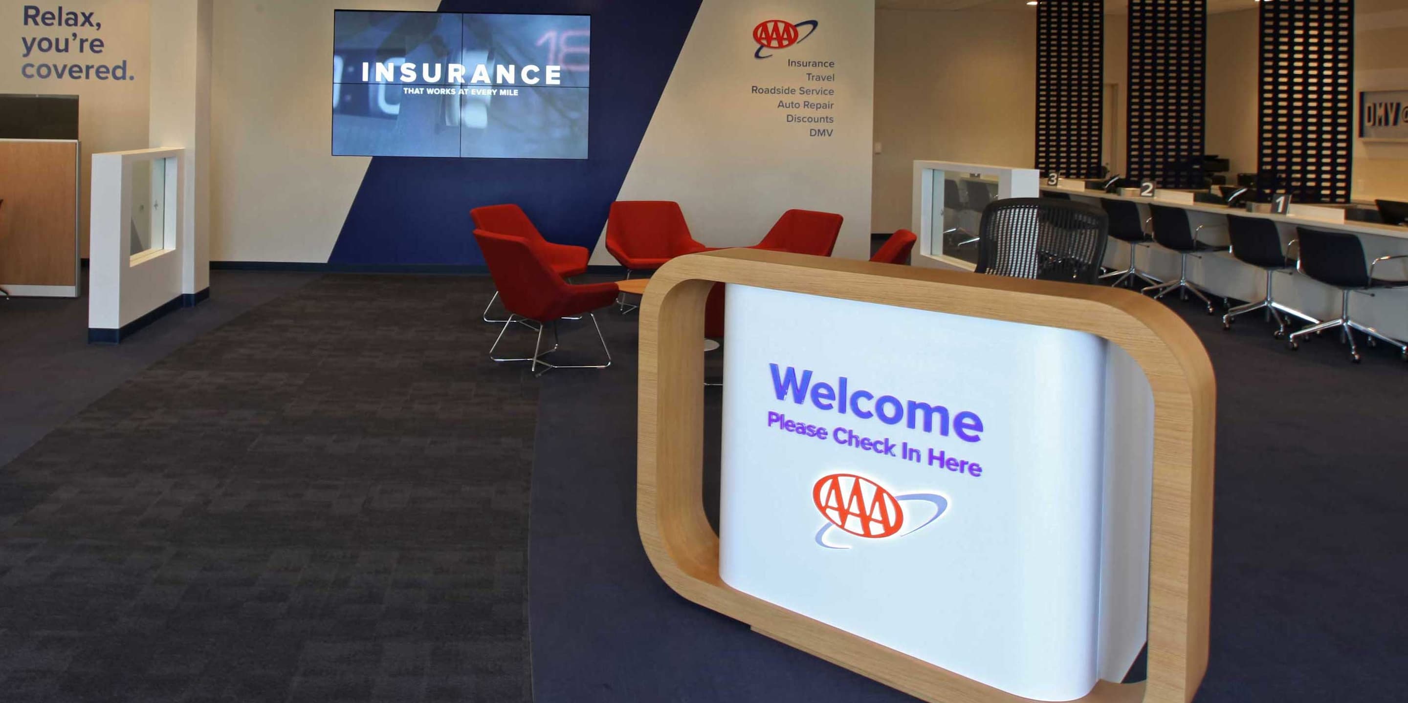 Welcome sign at the entrance to a local AAA Branch with Insurance Agents