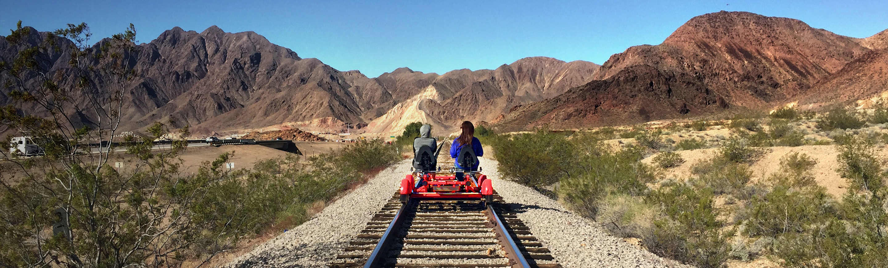 A family rides a Las Vegas Rail Explorers rail bike.