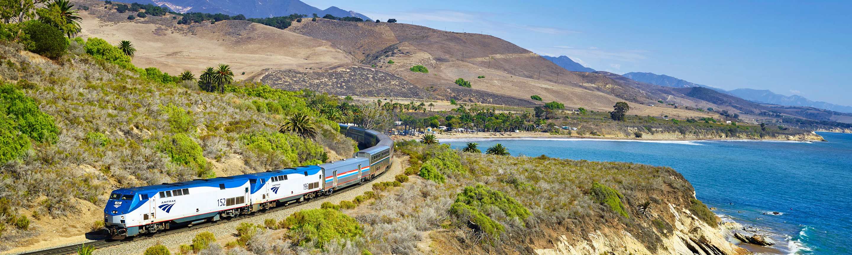 Amtrak train hugs the coast in Southern California.