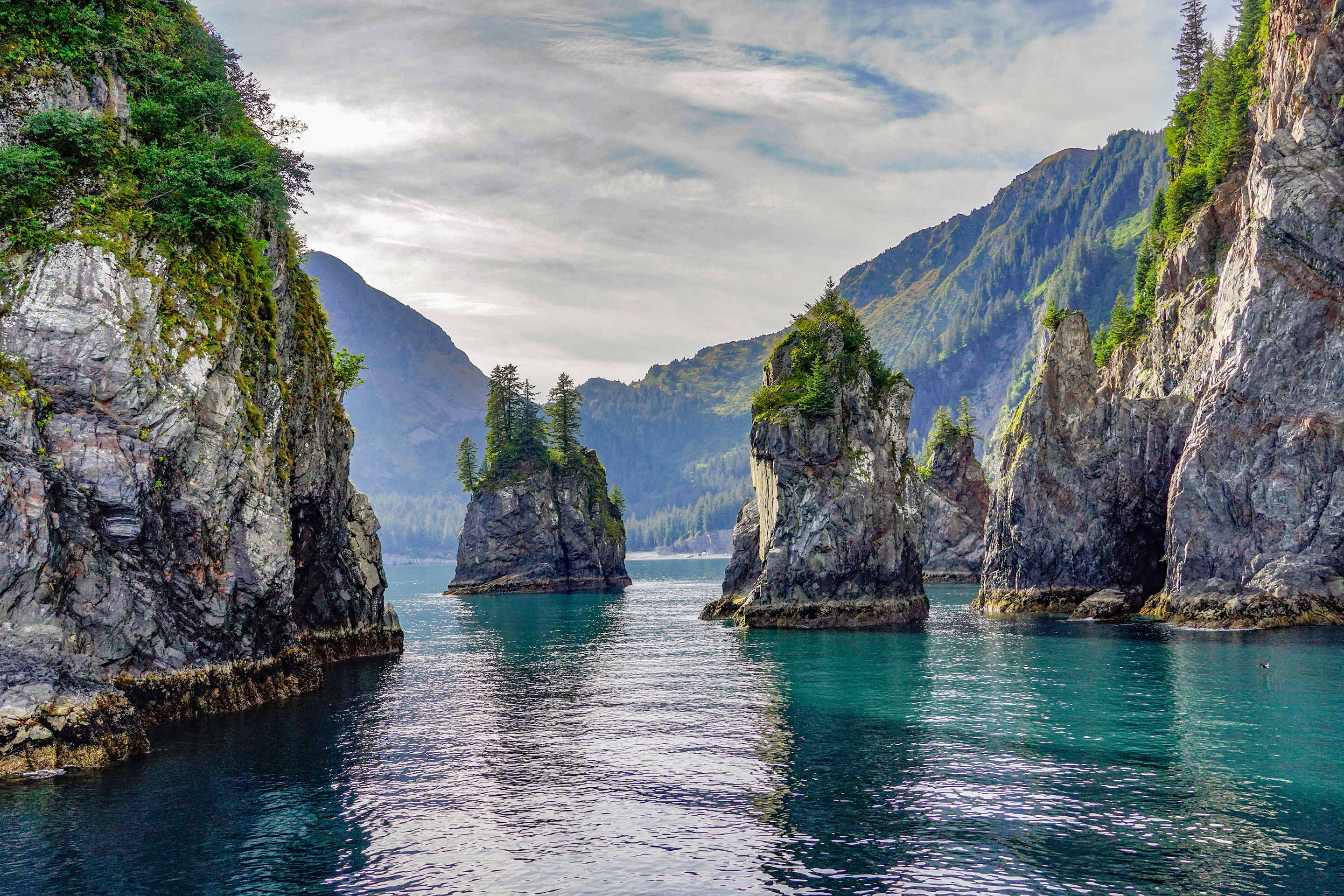 Rock Spires in the Turquoise Water of Spire Cove in the Kenai Fjords National Park.