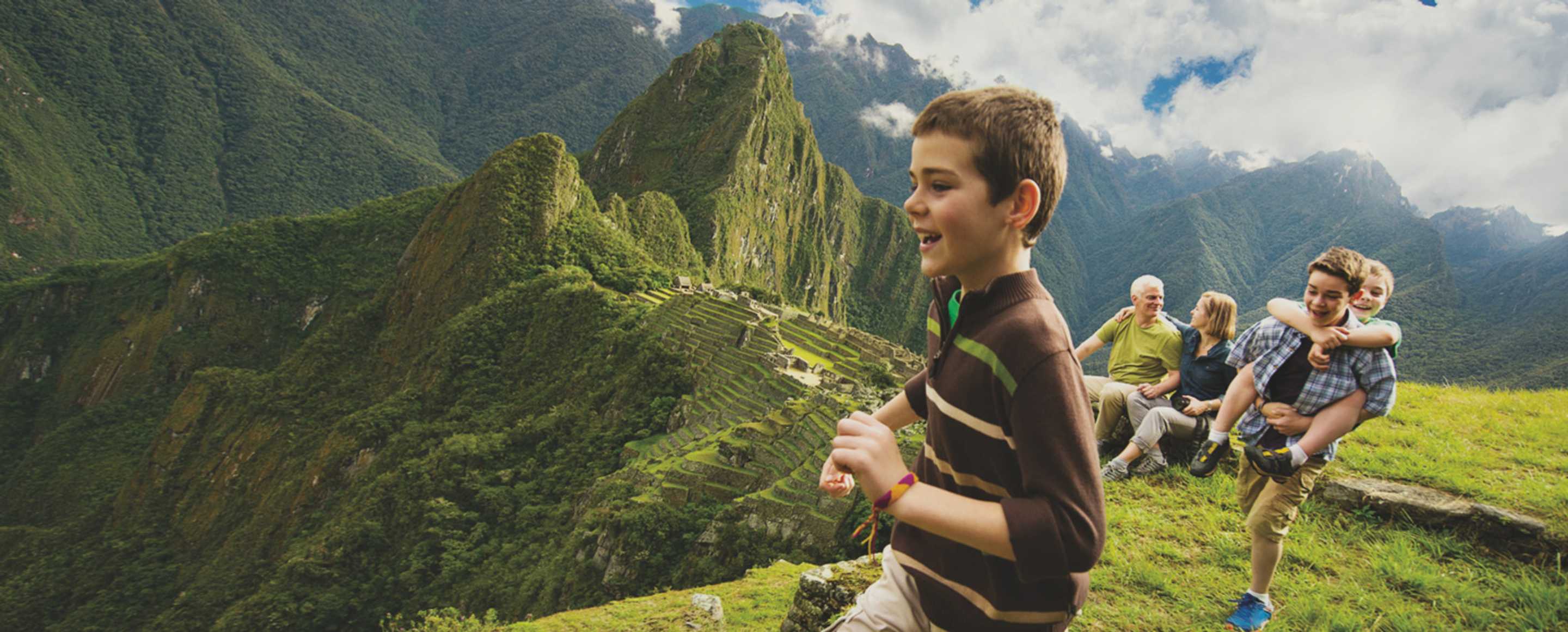 family on vacation at machu picchu in peru