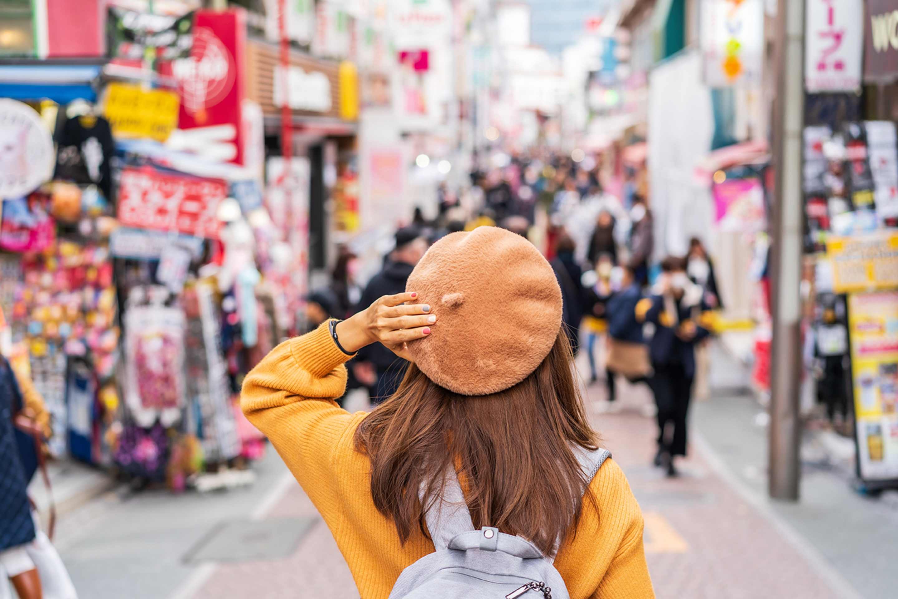 back of woman touring in japan