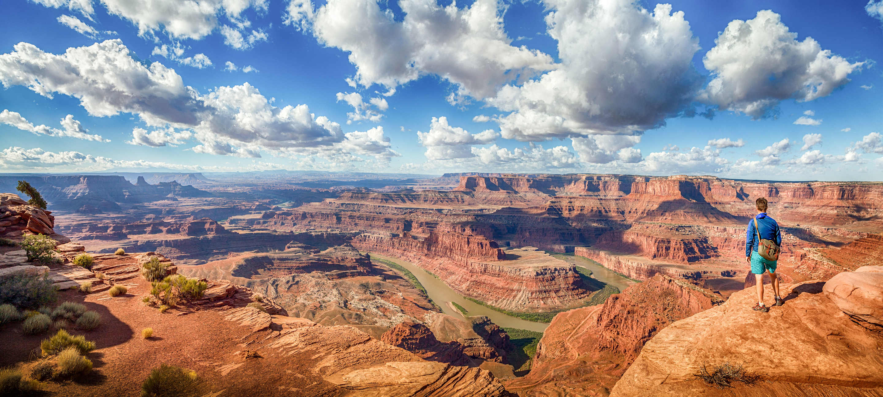 A visitor overlooks Dead Horse Point State Park in Utah.