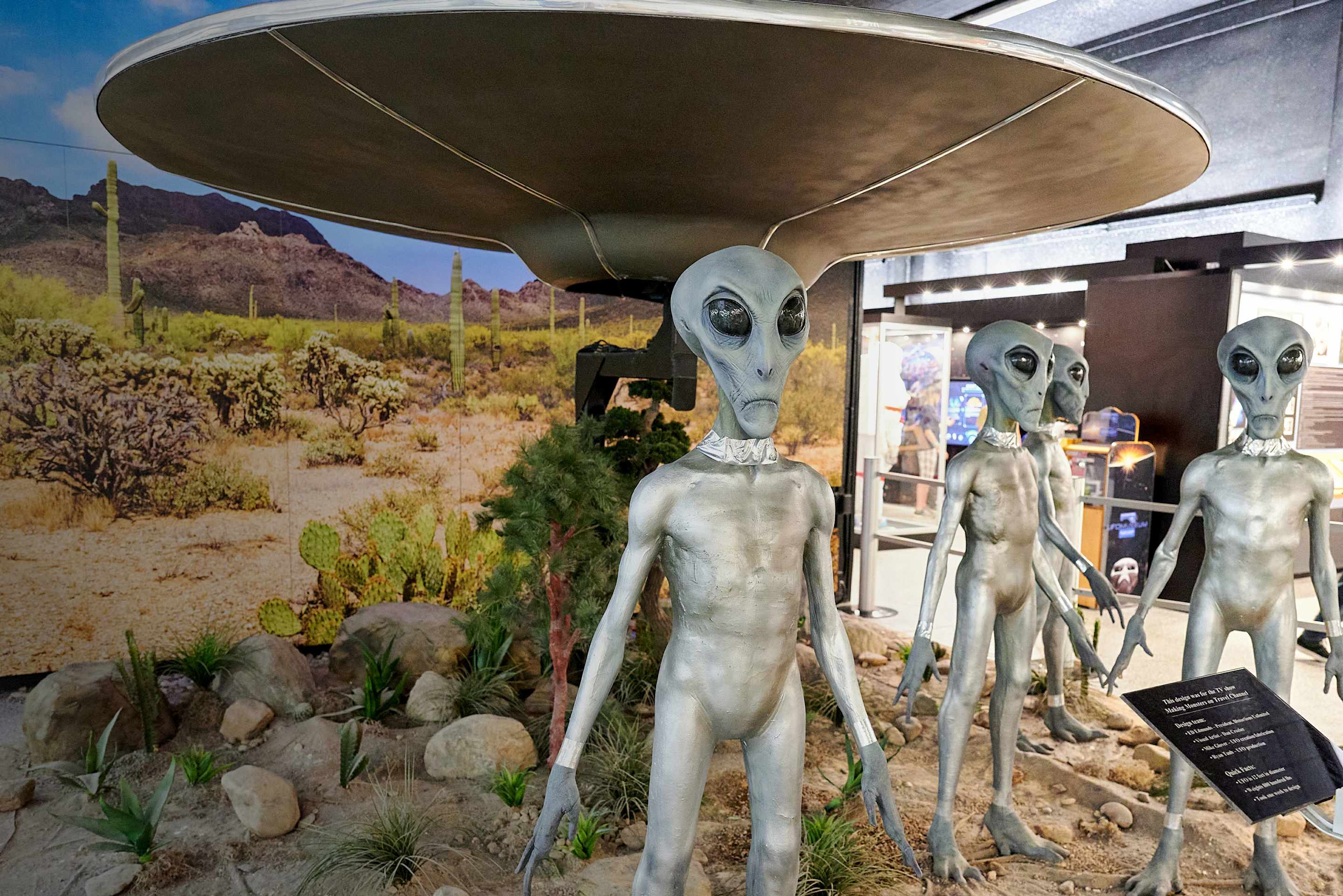 Simulated alien lifeforms clustered in an exhibit at the International UFO Museum