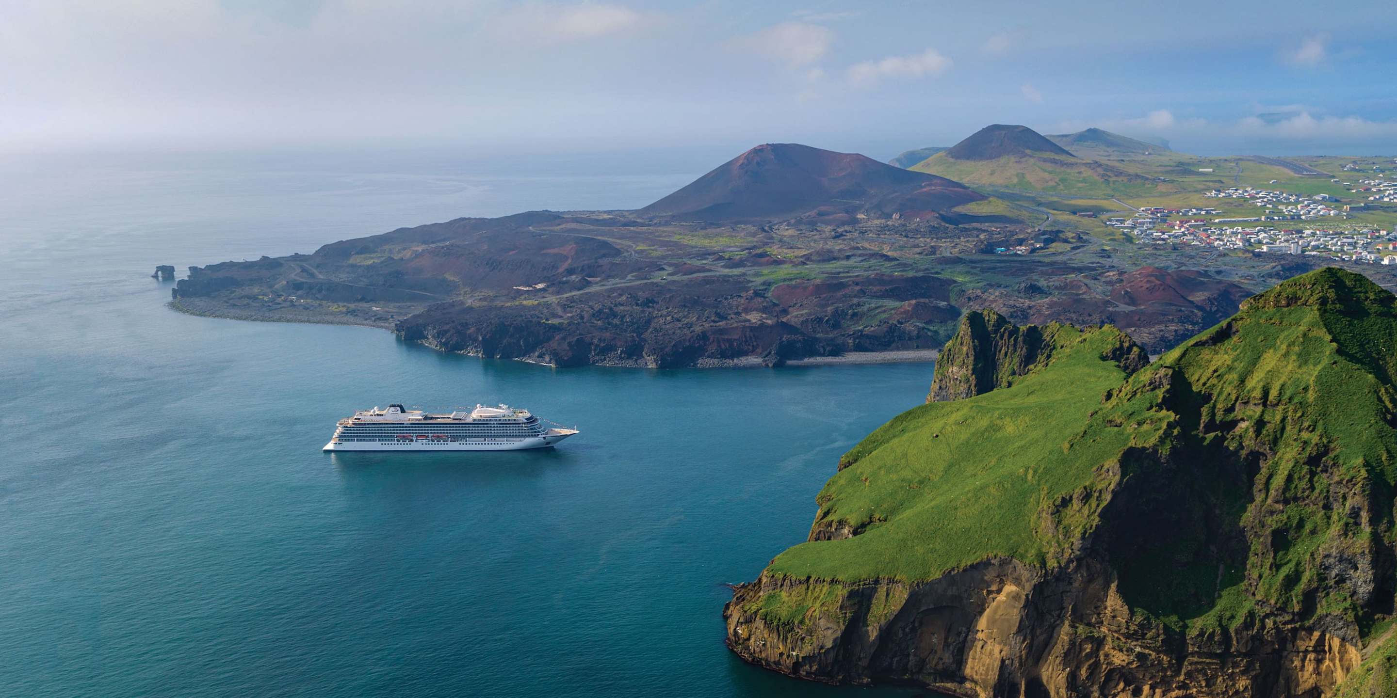 A Viking cruise ship approaches port in Iceland