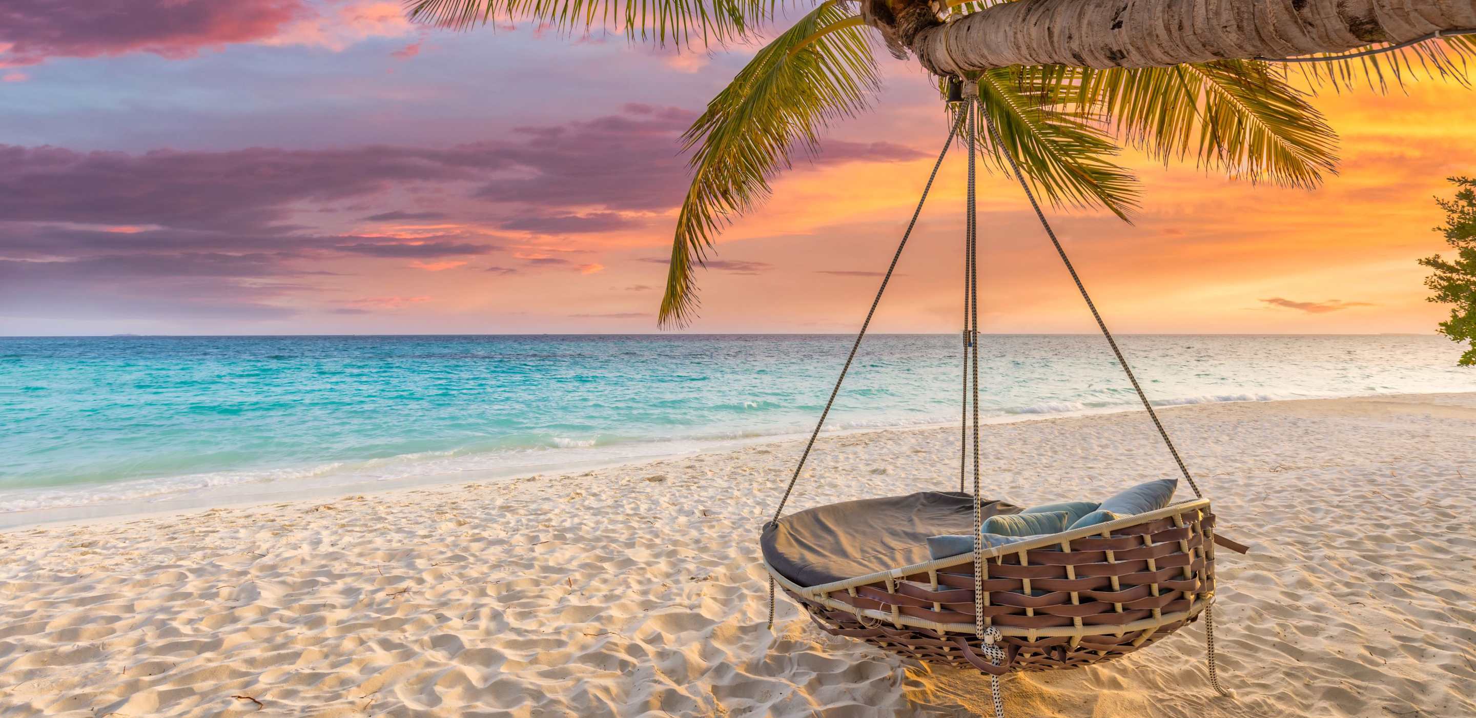 hammock chair on sandy beach