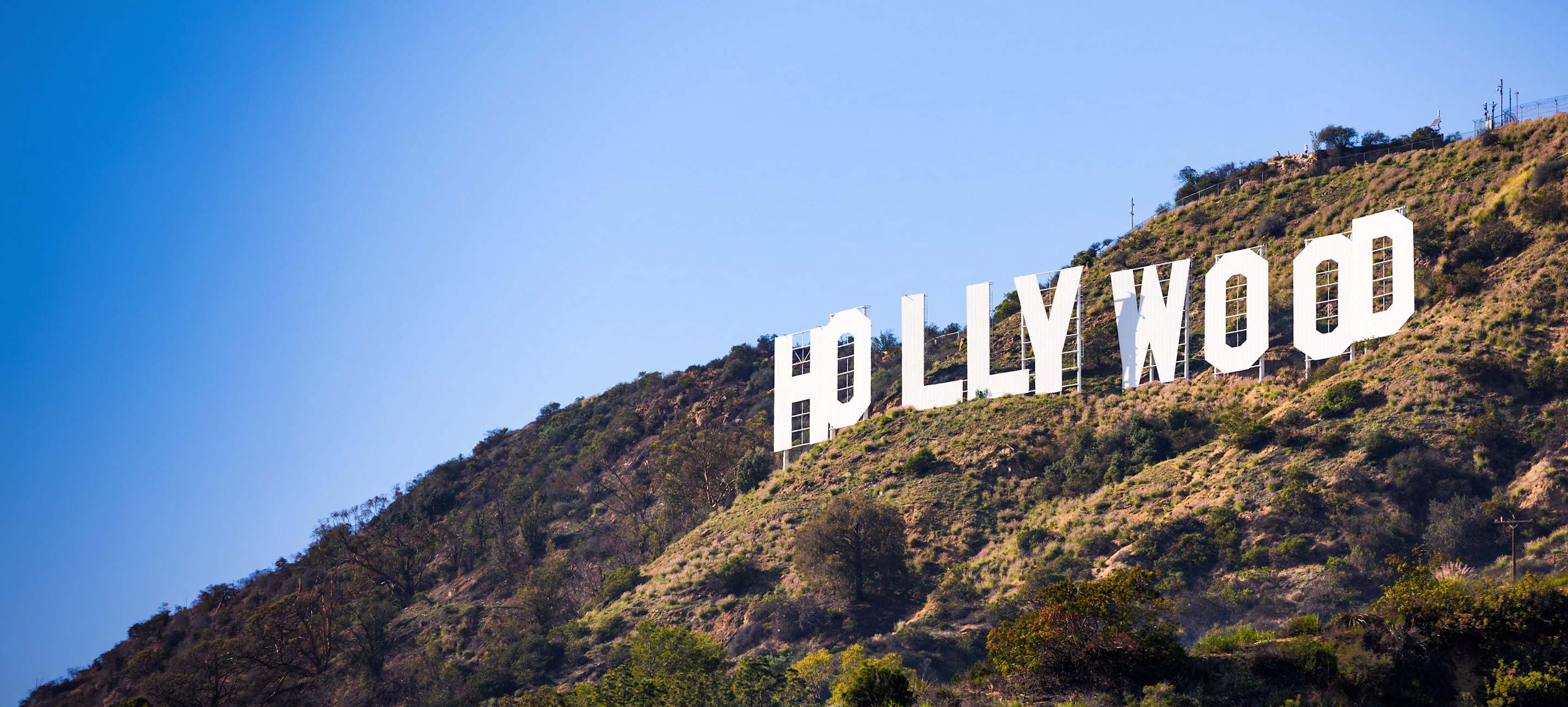 The Hollywood sign in a hill in Los Angeles on a clear day.