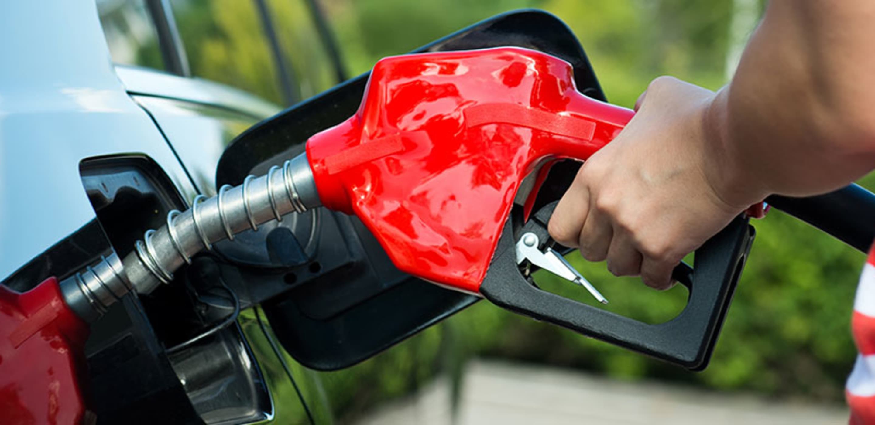 Person pumping gas
