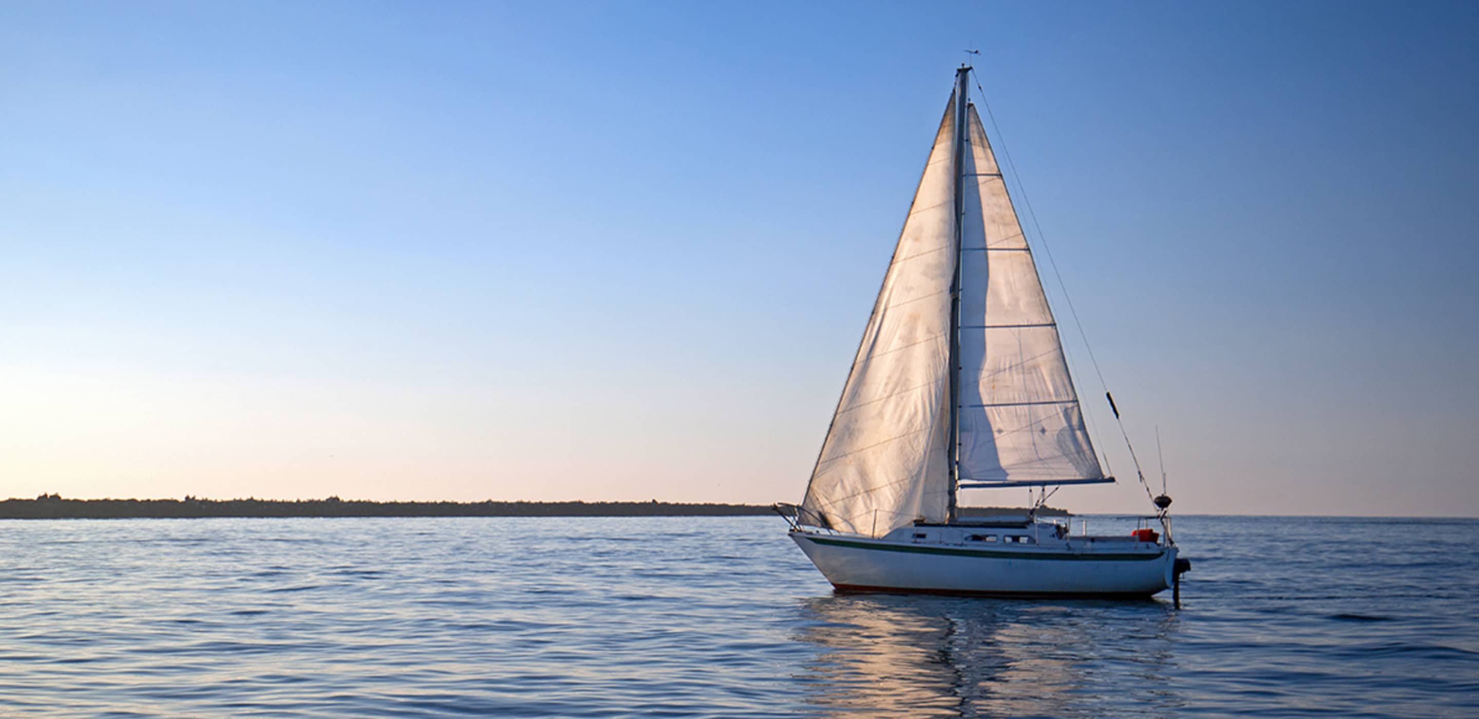sailboat sits on the water