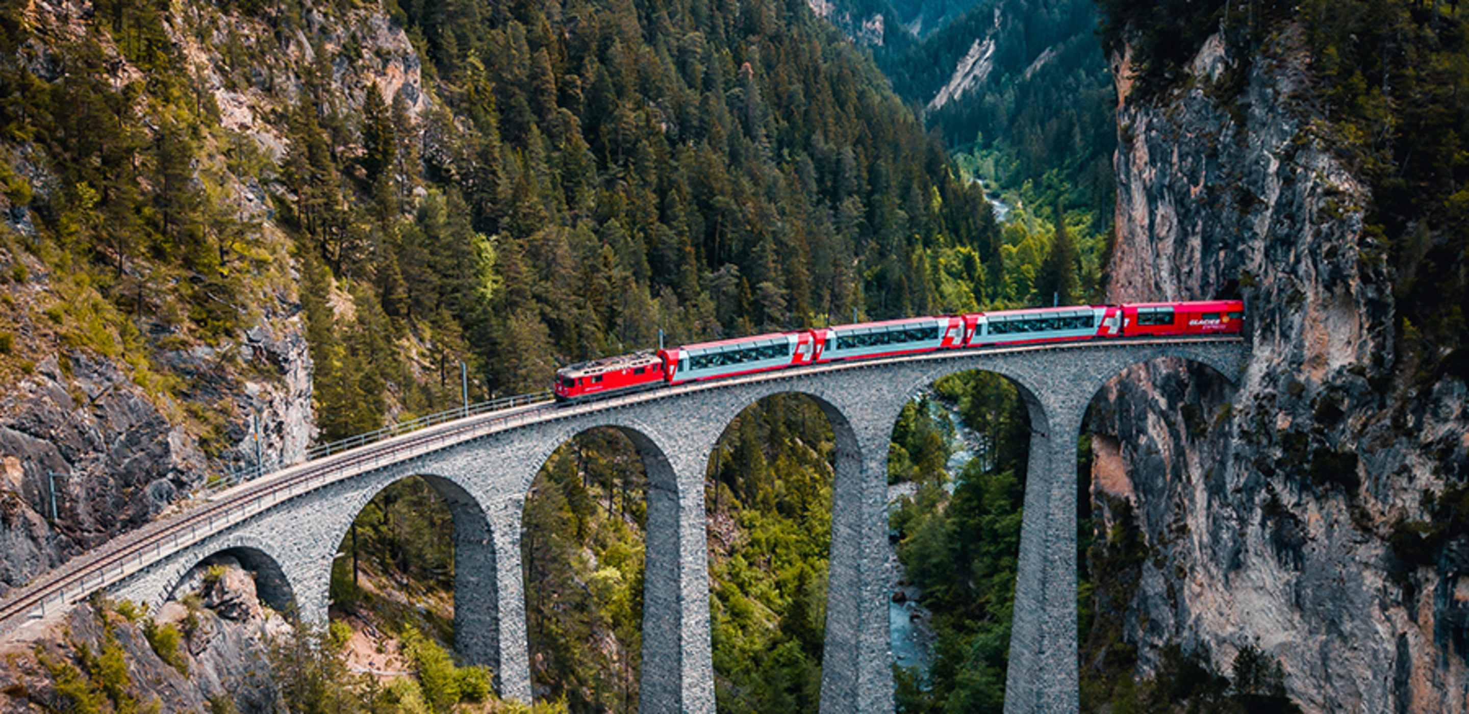 train crossing viaduct in switzerland