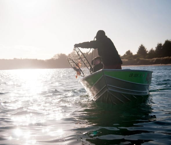 Fisherman checking crab pots off Oregon coast