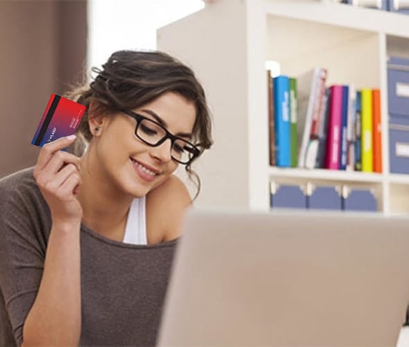 a woman shops online using her AAA membership for discounts