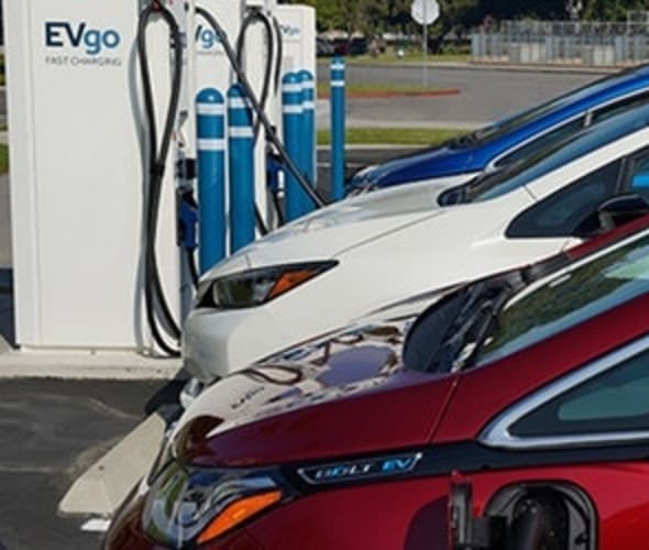 Electric vehicles charging at EVgo fast-charging stations