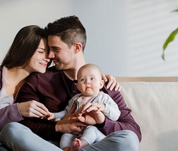 a young family settles into their new home with AAA Insurance