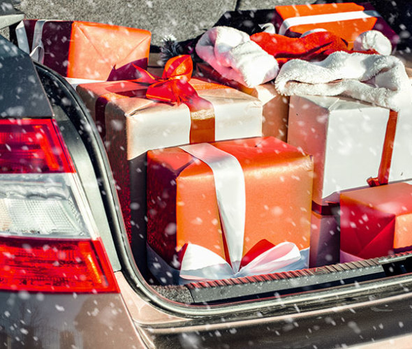 Trunk of a car full of wrapped presents