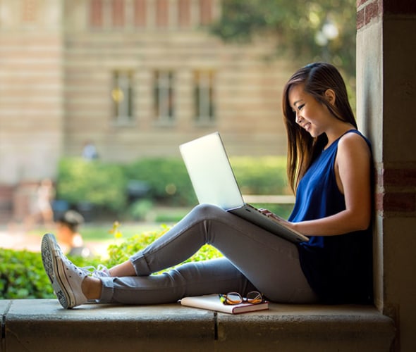 a college student studies on campus