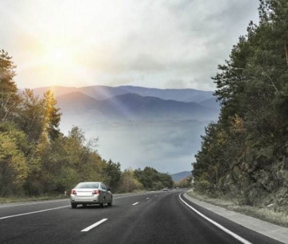 Car on open road with AAA Auto Insurance