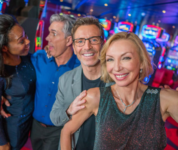 guests in casino on carnival cruise line