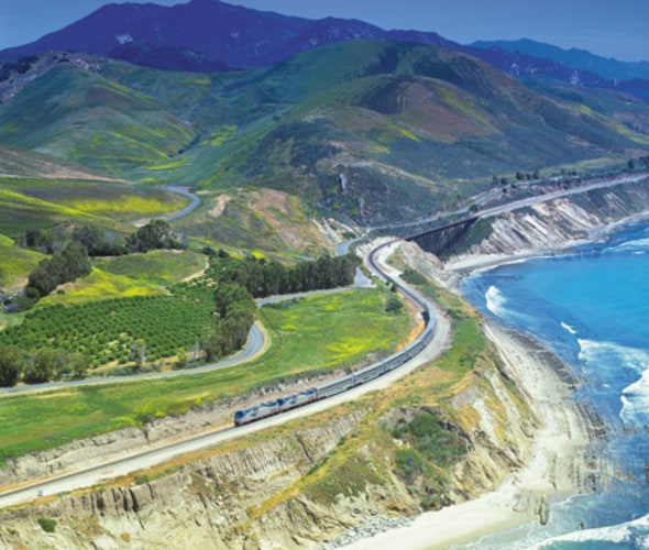 amtrak train traveling along pacific coast of the united states