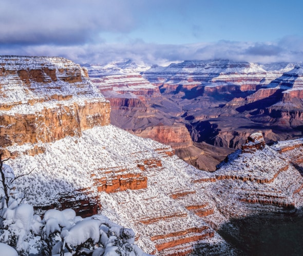 The Grand Canyon covered in snow.