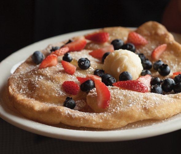 fresh fruit tops a Utah scone served at Penny Ann's Café in Draper.