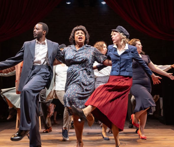 performers in theatrical production on cunard cruise