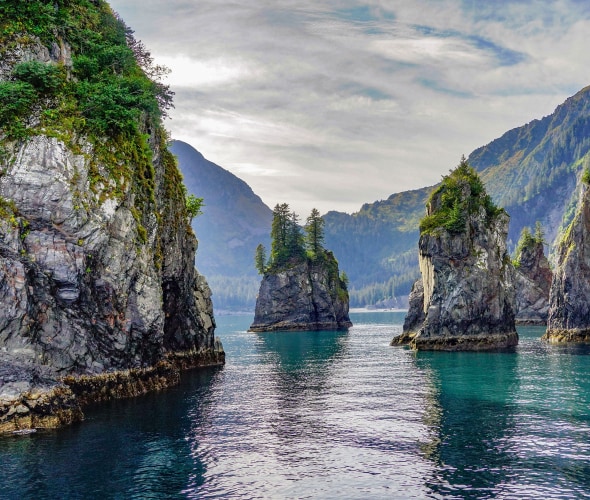 Rock Spires in the Turquoise Water of Spire Cove in the Kenai Fjords National Park.