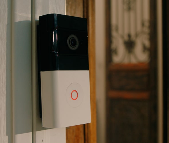 Doorbell camera mounted on wall