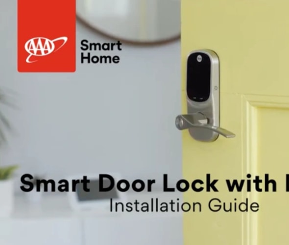 a smart door lock with lever on a yellow door