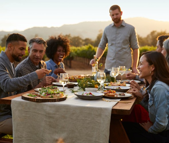 People dine outside at the Farm-to-Table Dinner at Kendall-Jackson in Fulton, California.