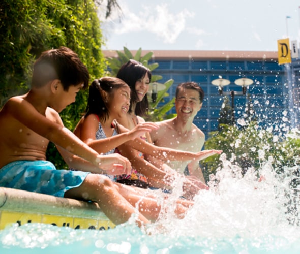 family at disneyland resort pool