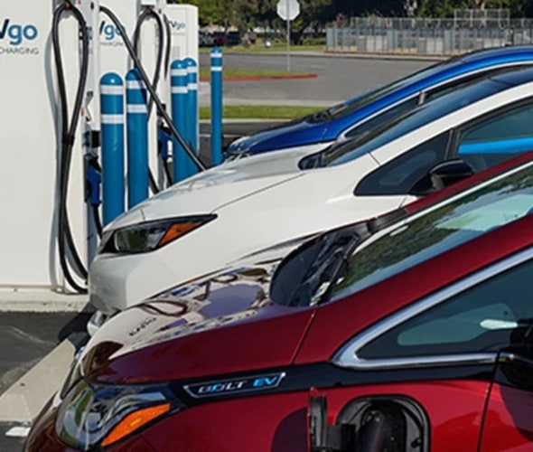 Electric vehicles charging at EVgo fast-charging stations