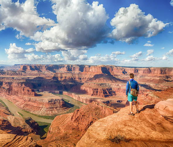 A visitor overlooks Dead Horse Point State Park in Utah.