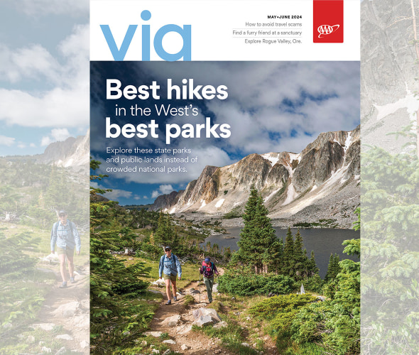 Two hikers climb a trail in the Medicine Bow Wilderness in Wyoming on the cover of the May June 2024 issue.