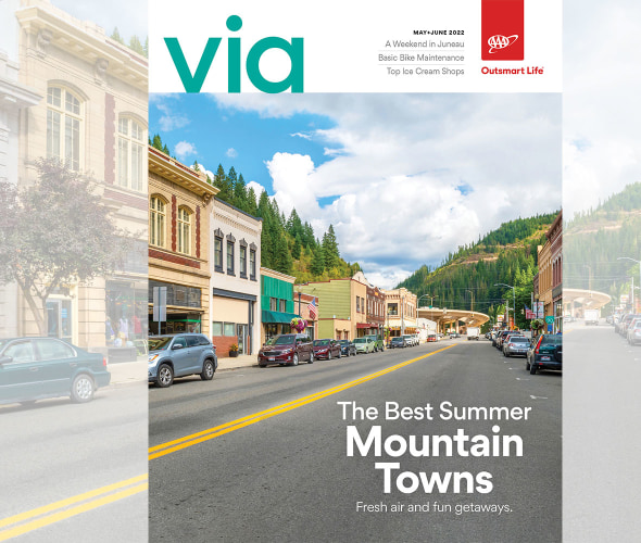 A road through downtown Wallace, Idaho on the cover of Via magazine May June 2022 issue.