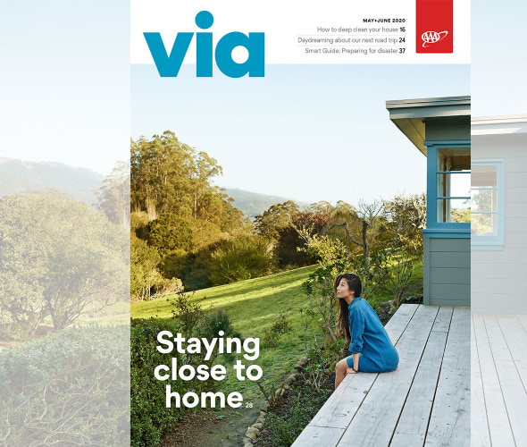 AAA Member sitting on her deck on the cover of Via magazine's May June 2020 issue.