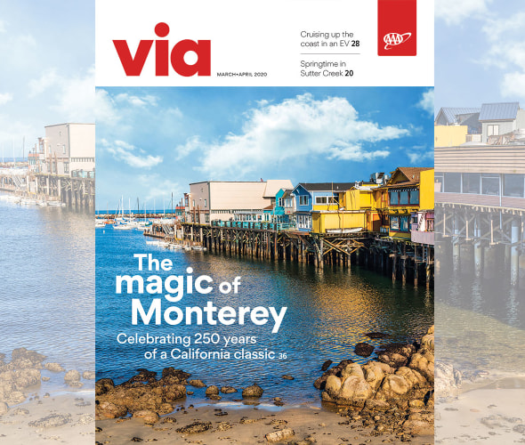 View of a pier in Monterey, California on the cover of Via magazine's March April 2020 issue.