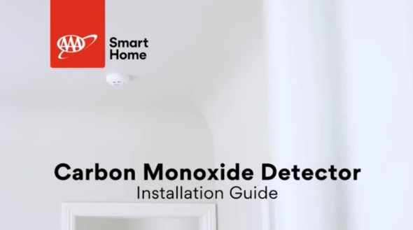 a carbon monoxide detector on the ceiling