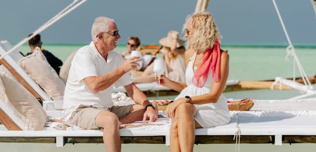 AAA Member floats down a lazy river in an innertube 