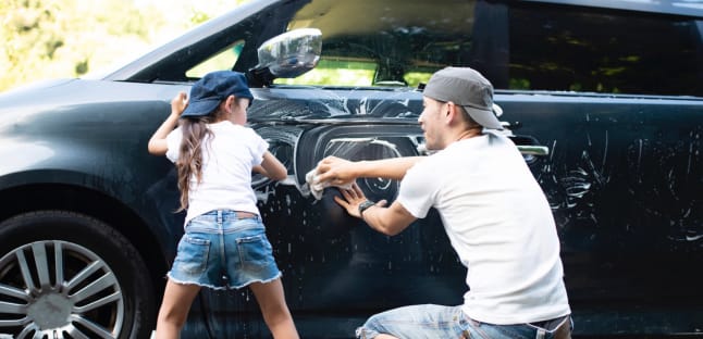 woman washing car