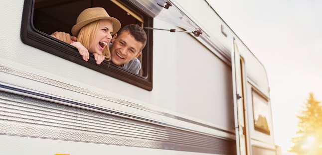 Members smiling in RV